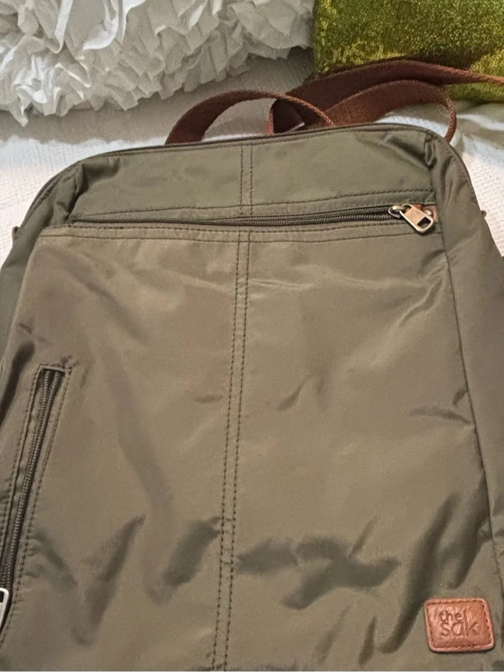The Sak Olive Green Backpack with Brown Accents
